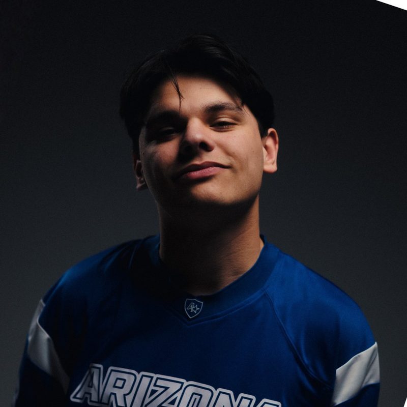DEVERAUX, trance and hard house DJ from Venray, in a blue Arizona jersey against a dark background